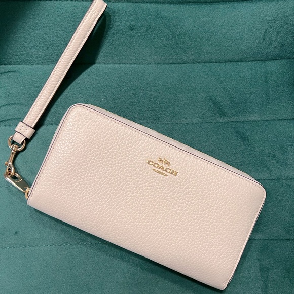 Coach Handbags - Ivory Coach Wristlet Wallet